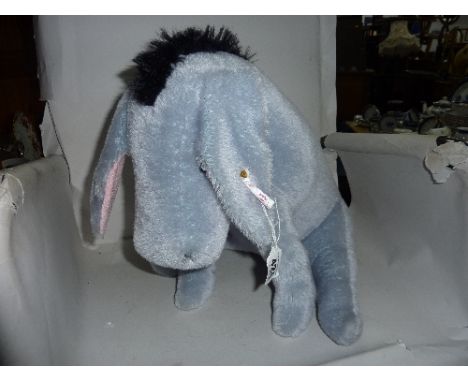 AN UNBOXED LTD EDITION STEIFF PLUSH SOFT TOY, 'EEYORE' the donkey, 409/1500 height approximately 33cm