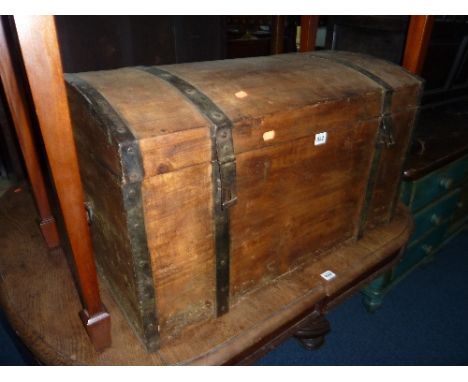 A PINE METAL BANDED DOME TOP TRUNK