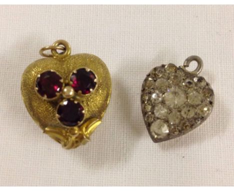 2 heart shaped pendants. An antique ornate keepsake pendant, set with 3 garnets, glass panel on reverse containing hair - Tes