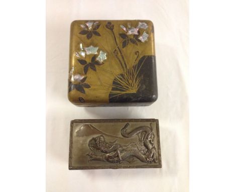 2 oriental boxes - Chinese papier mache square lidded box inlaid with mother of pearl and a Japanese metal trinket box with d
