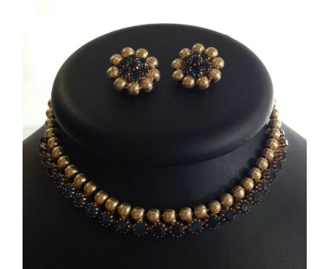 A vintage Weiss goldtone necklace set with sapphire coloured stones with matching earrclips