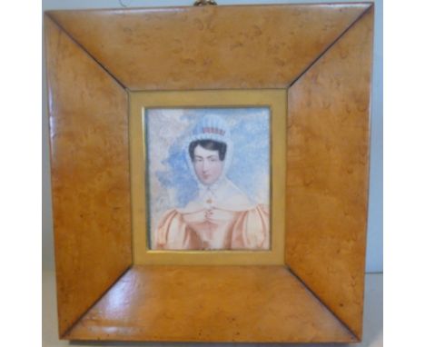 A late 19thC portrait miniature, a half length portrait, one Caroline Ridgwood, wearing a bonnet and a red dress  3.5'' x 3''