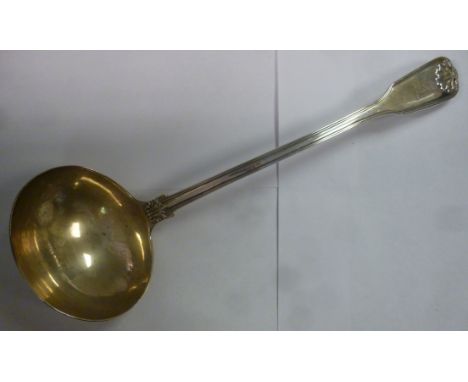 A George IV silver fiddle, thread and shell pattern soup ladle  bears an engraved armorial  William Eaton  London 1826 