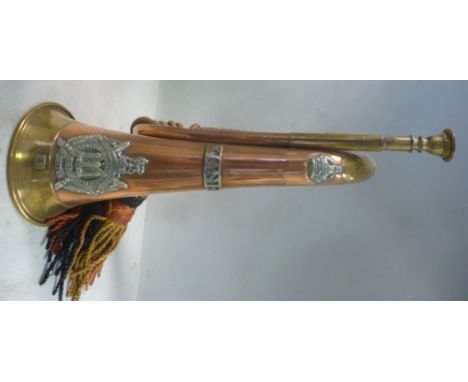 A copper and brass bugle, bears the emblem of The King's Own Scottish Borderers regiment, EM, impressed WD and 6111 Bugler E 