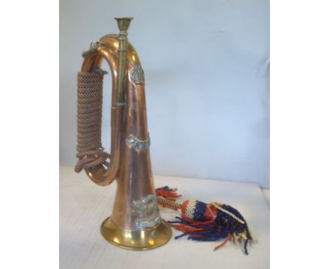 A copper and brass bugle, bears the emblem of the Hindoo Star, Leicestershire regiment, St impressed WD Ypres 1917 and 966 Bu