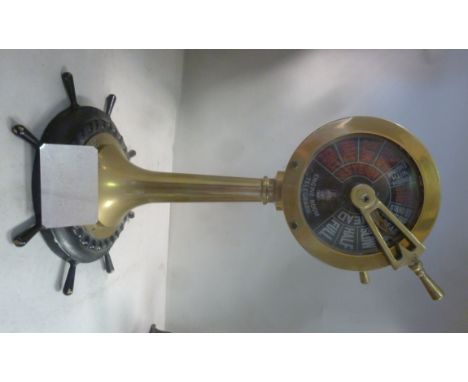 An early 20thC ship's brass engine room telegraph  13''h; later mounted on a miniature ship's wheel, as a presentation to the