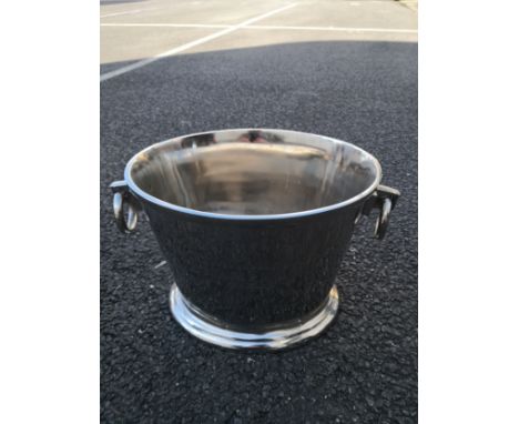 A 20th century twin ring handled 'Cuvée de Prestige Champagne Du Louvois' ice bucket with marks. H.25cm