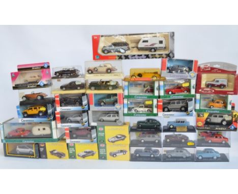 36 boxed 1/43 scale diecast model vehicles to include Cararama, Atlas Editions, Guisval and Solido. Most models not attached 