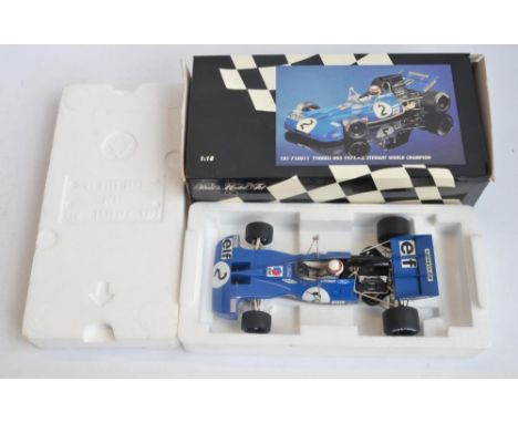 Minichamps (Paul's Model Art) 1/18 scale diecast Tyrell 003 1971, Jackie Stewart World Champion (181 710011). Model in slight