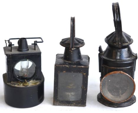 Three vintage railway lamps to include LMS and BR(M) stamped examples, larger signal lamp has no markings 