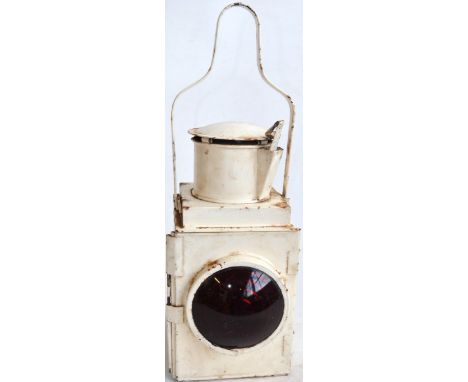 Large white painted railway tail lamp, no internal burner or makers marks, stamped BR(M). With fixed red glass lens, height a