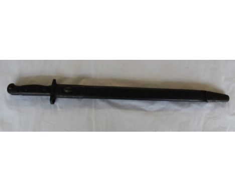 WWI 1907 British SMLE sword bayonet. In original leather scabbard with stamp mark A.C. and broad arrow also various markings 