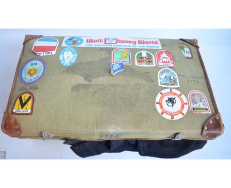 Suitcase containing naval uniforms and clothing, a pair of Heath &amp; Co binoculars (leather case stamped with broad arrow),