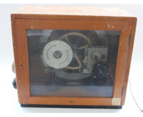 Mid C20th Gents of Leicester Pulsynetic Impulse Timer, Serial No. NU113379, in glazed beech case, H40cm 