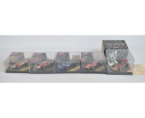 Five Vitesse Quartzo 1/43 scale diecast classice racing car models, well detailed and presented. All with clear acrylic displ