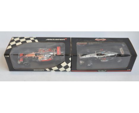 Two boxed Minichamps (Paul's Model Art) 1/18 scale diecast McLaren Mercedes MP4 models to include Vodafone MP4-22 F. Alonso 2