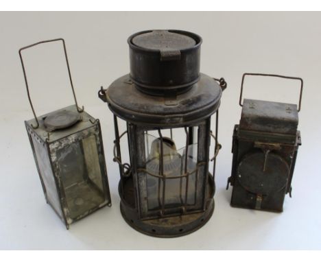 Parkinson and Cowen large railway lamp Dated 1017. Military Railway Guards  hand lamp and a night watchman's candle lantern (