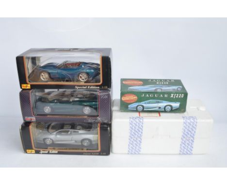 4x boxed diecast Jaguar model cars to include 3x 1/18 scale Maisto (2x XJ220 and 1x XK180) and a 1/24 Matchbox Masterclass Co