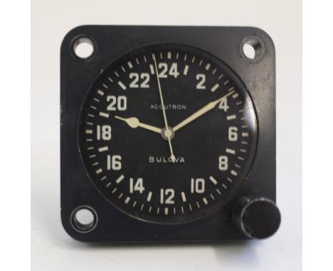 1964 Bulova Accutron cockpit clock with signed 24 hour arabic dial and centre seconds in black anodised housing, Bulova 214 m