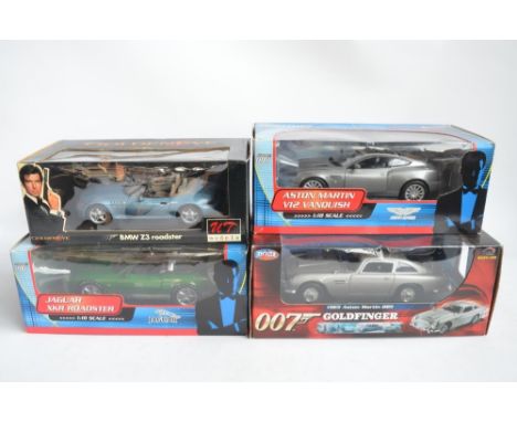 4x 1/18 scale diecast James Bond related model cars to include Joy Ride 1965 Aston Martin DB5, Paul's Model Art/Beanstalk Gro