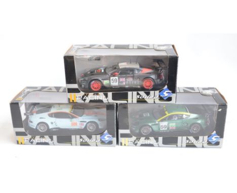 Three boxed Solido Racing sries Aston Martin DB9 highly detailed 1/18 scale diecast car models all in near mint condition. Fe