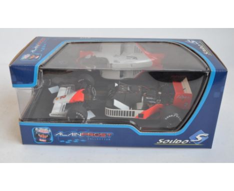 Boxed Solido 1/18 scale diecast Alain Prost Collection McLaren Tag Turbo MP4/2 No 2 (141281). Model in mint condition, box ne