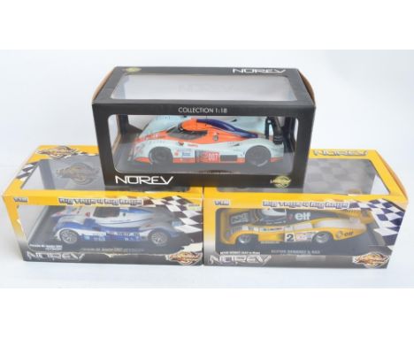 Three boxed 1/18 scale diecast car models by Norev to include Alpine Renault A442 Le Mans 1978, Porsche RS Spyder 2007 Dyson 