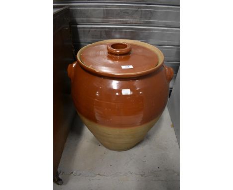 A large sized ceramic grain or food bin with lid