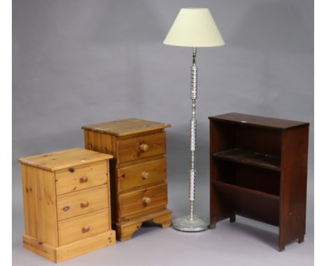 A small standing three-tier open bookcase, 24¾” wide x 31” high, together with two pine three-drawer chests, and a standard l