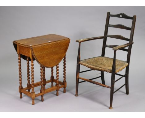 A 1930’s oak oval date-leg occasional table on barley-twist legs &amp; turned feet with plain stretchers, 25” wide x 28½” hig