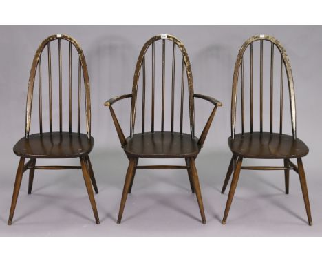 Three Ercol spindle-back dining chairs (including one carver chair), slight faults.