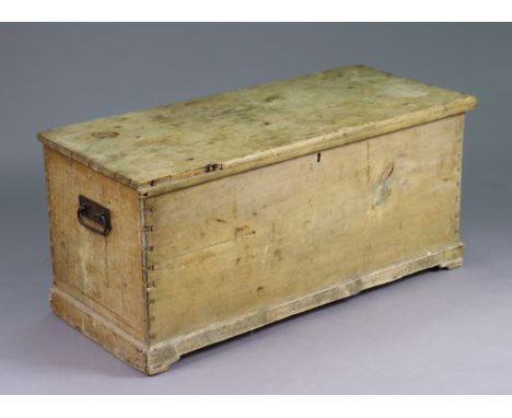 A vintage deal blanket box with hinged/removable lift-lid, having iron side handles, and on a shaped plinth (slight faults), 