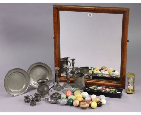 An oak frame rectangular wall mirror, 26”x23¾”, together with a black papier maché trinket box with floral painted decoration