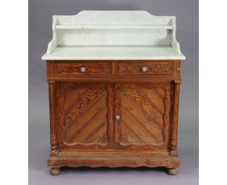 A Victorian pitch pine marble-top washstand fitted two frieze drawers above a cupboard enclosed by a pair of panel doors, &am