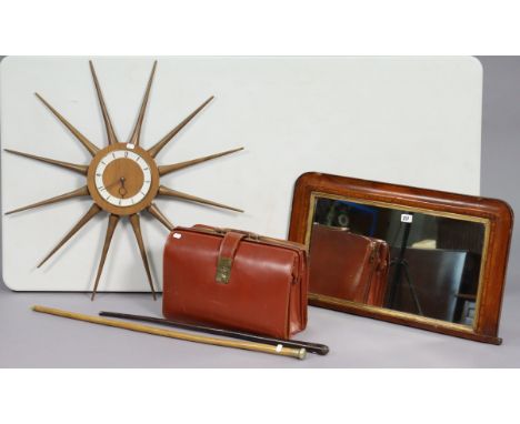 An early 20th century inlaid-walnut overmantel mirror, 17½”x28”, together with a tan leather briefcase, a wall clock (dial lo