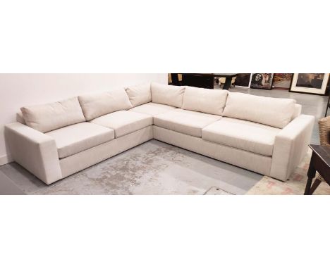 CORNER SOFA, in a stone coloured fabric, 317cm x 28cm x 75cm.