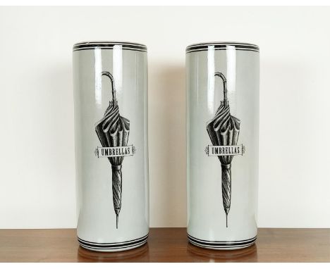 UMBRELLA STANDS, a pair, ceramic with umbrella design, 60cm H x 22cm W. (2)