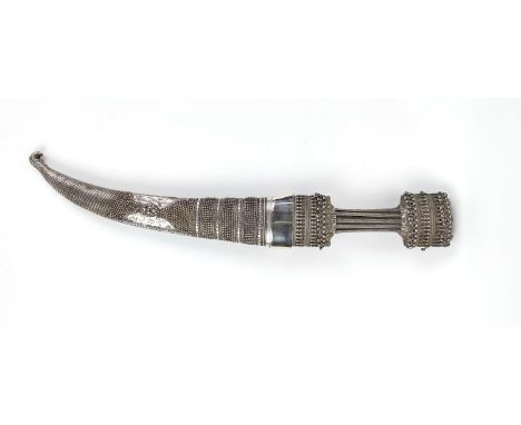 A JAMBIYA DAGGER AND SCABBARD WHITE METAL CASING, steel blade, horn structure to scabbard, 52cm L