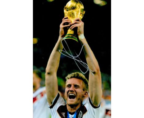 Andre Schurrle signed Germany 12x8 colour photo. André Horst Schürrle (born 6 November 1990) is a German former professional 