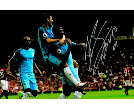 Kelechi Iheanacho signed Manchester City 12x8 colour photo. Kelechi Promise Iheanacho (born 3 October 1996) is a Nigerian pro