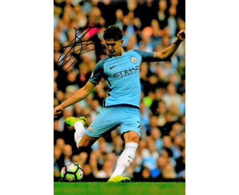 John Stones signed Manchester City 12x8 colour photo. John Stones (born 28 May 1994) is an English professional footballer wh