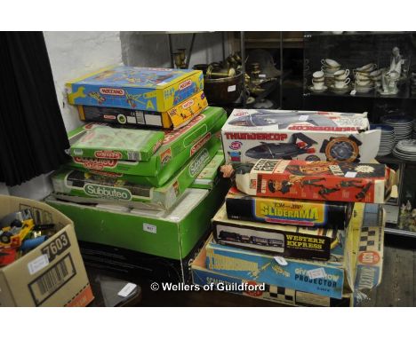 Quantity of vintage games including Subbuteo, Thunderbirds, Scalextric and Action Man