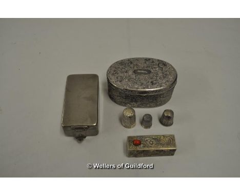 Continental white metal trinket box with decorative lipstick compact, three silver thimbles and another trinket box