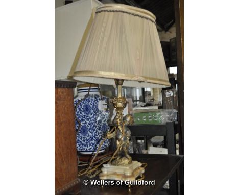 Lamp with marble base, gilt cherub stem and folded fabric shade