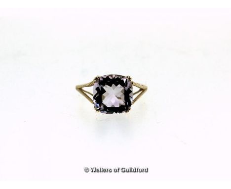 Amethyst single stone ring, cushion cut amethyst, weighing an estimated 6.30cts, mounted in 9ct yellow gold, with split shoul