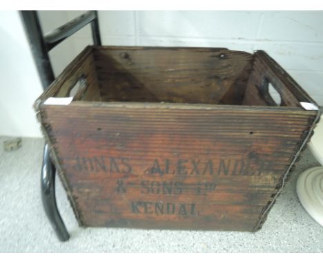 A vintage advertising bottle crate for Alexander and son's Kendal