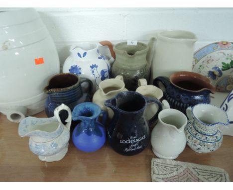 A selection of ceramic jugs and similar kitchen wares