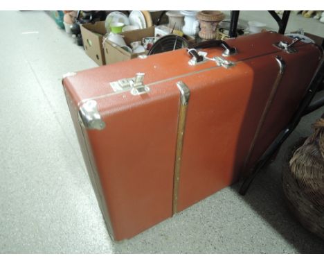 A tan coloured vintage suitcase/trunk, good condition, approx 19650s/60s.
