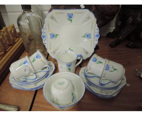A vintage part tea service by Shelley with hand decorated Tulip design rd no. 11941