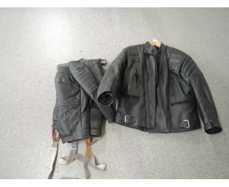 A set of vintage motor cycle or bike leathers Jacket and trousers by B.T.K